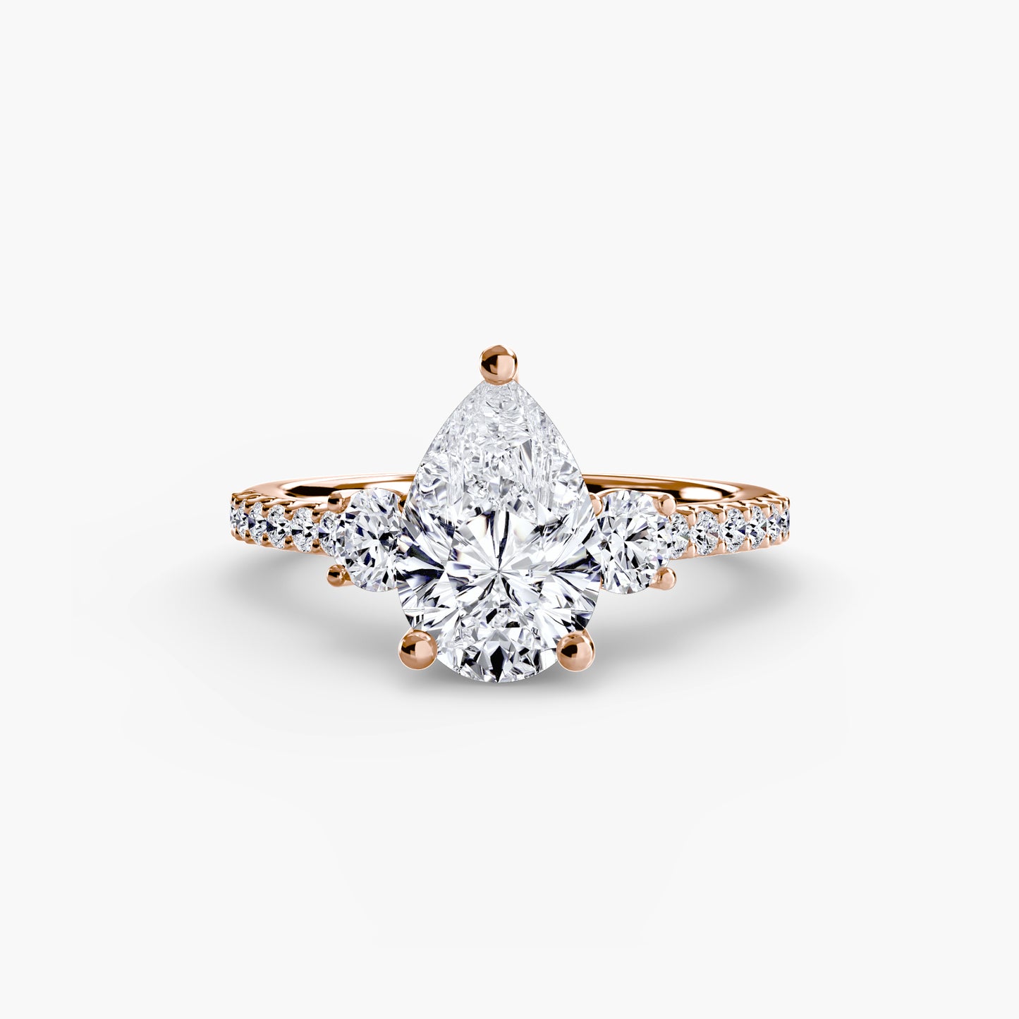 The "Victoria" Three-Stone Ring with Pavé Band