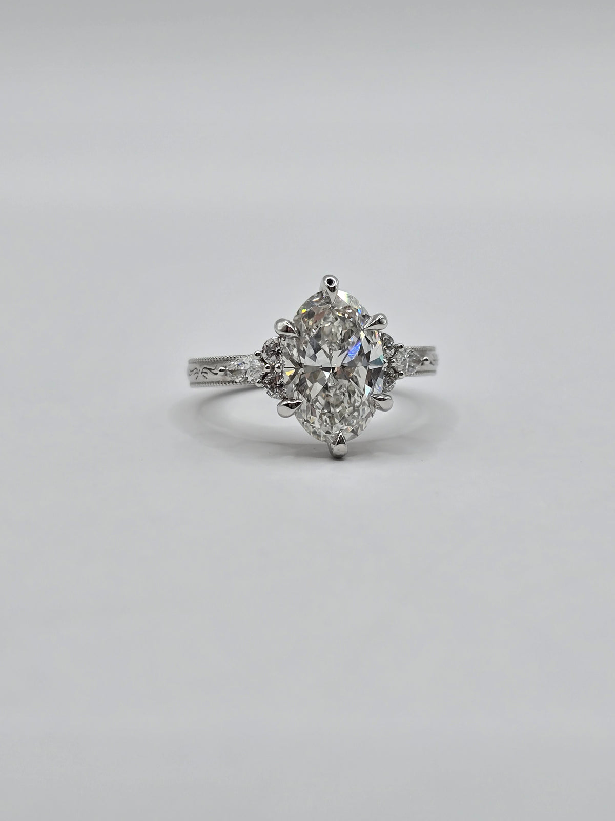10KW Custom "Camellia" Eng Ring 2.50 ct E/VS1 Oval Lab Diamond - IGI Certified