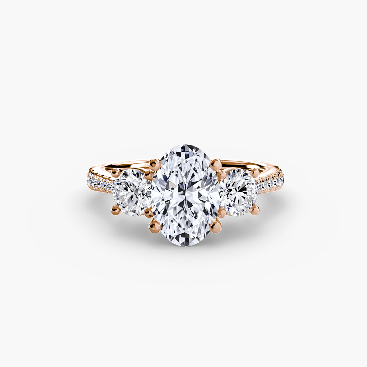The "Giuliana" Three-Stone with French Set Diamond Ring