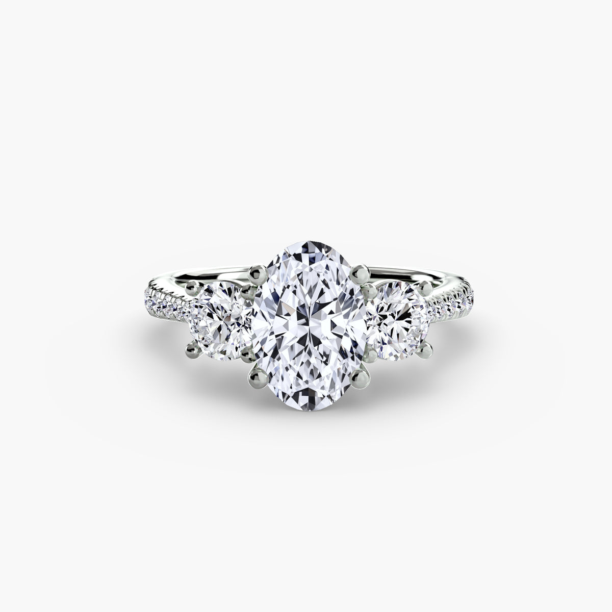 The "Giuliana" Three-Stone with French Set Diamond Ring