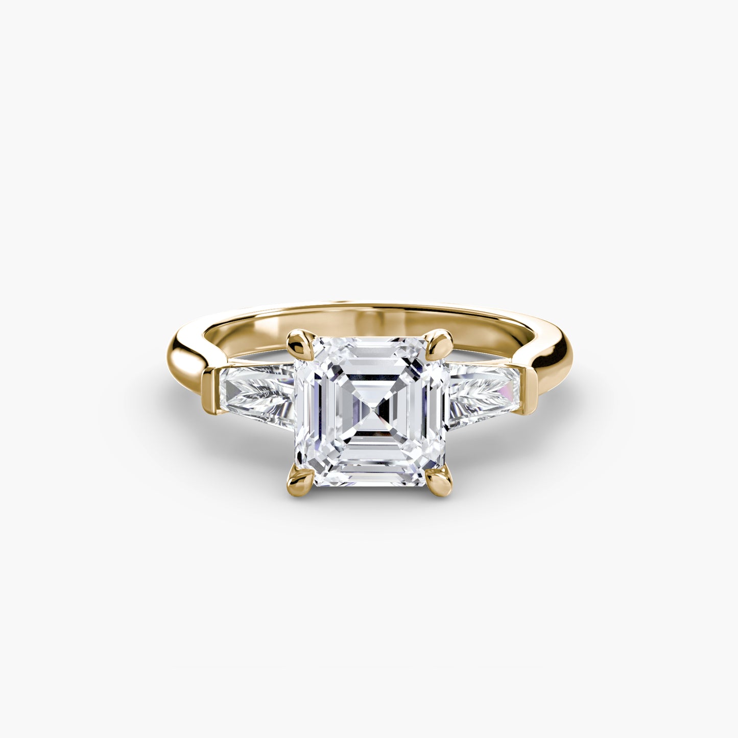 The "Aria" Three-Stone Ring with Tapered Baguettes