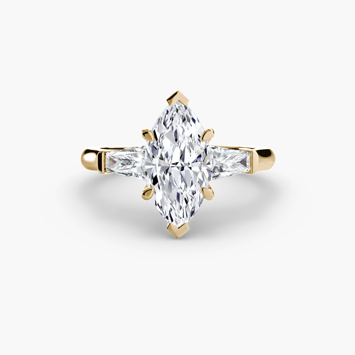 The "Aria" Three-Stone Ring with Tapered Baguettes