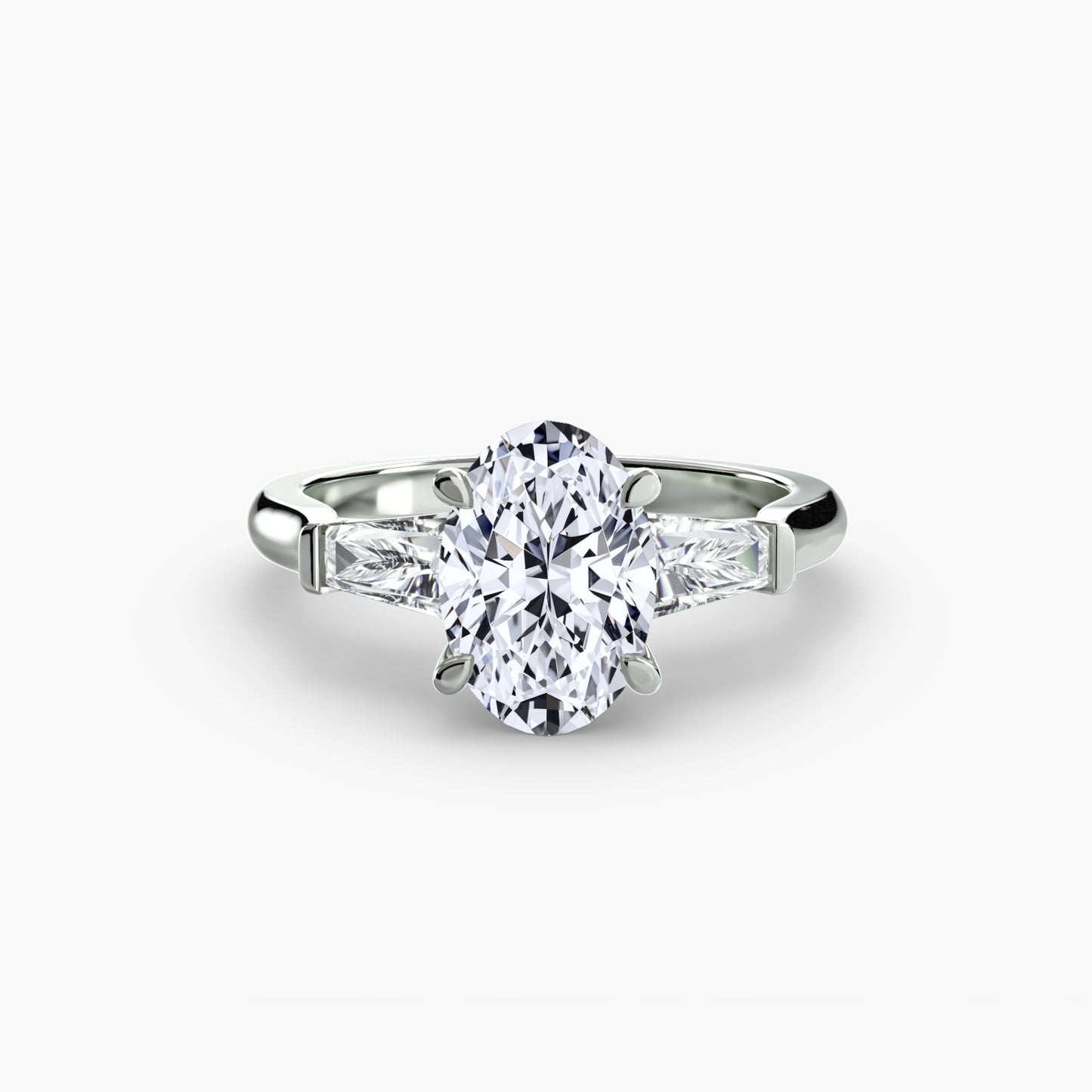 The "Aria" Three-Stone Ring with Tapered Baguettes