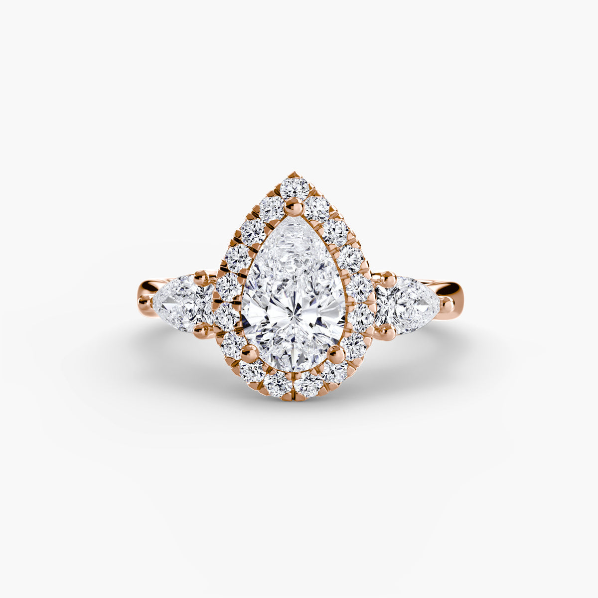 The "Audrey" Halo Three-Stone Ring