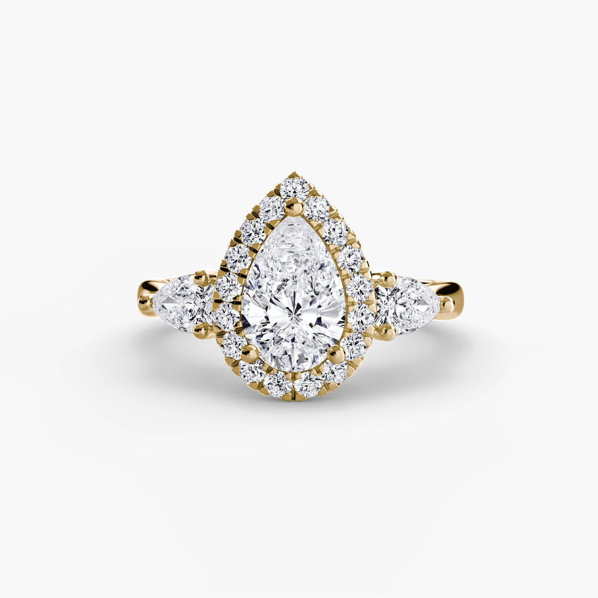 The "Audrey" Halo Three-Stone Ring