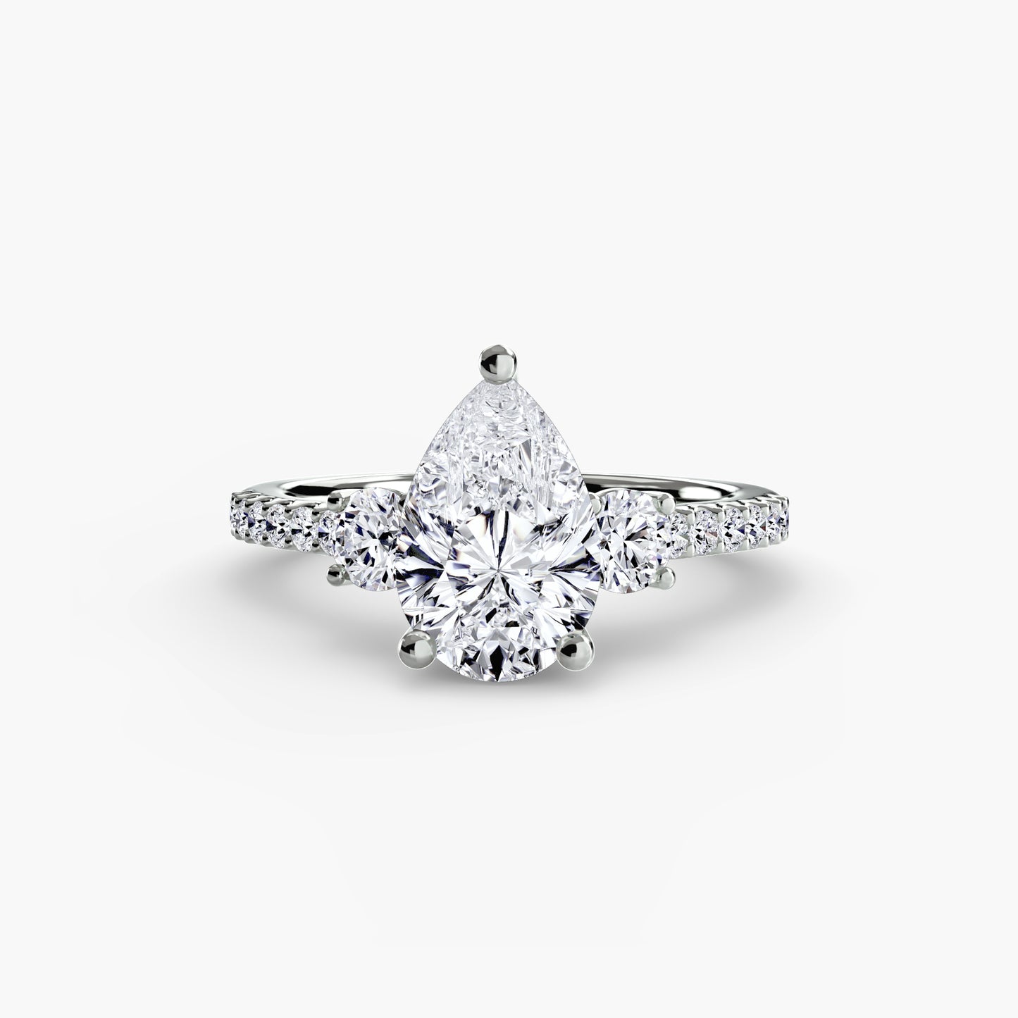 The "Victoria" Three-Stone Ring with Pavé Band