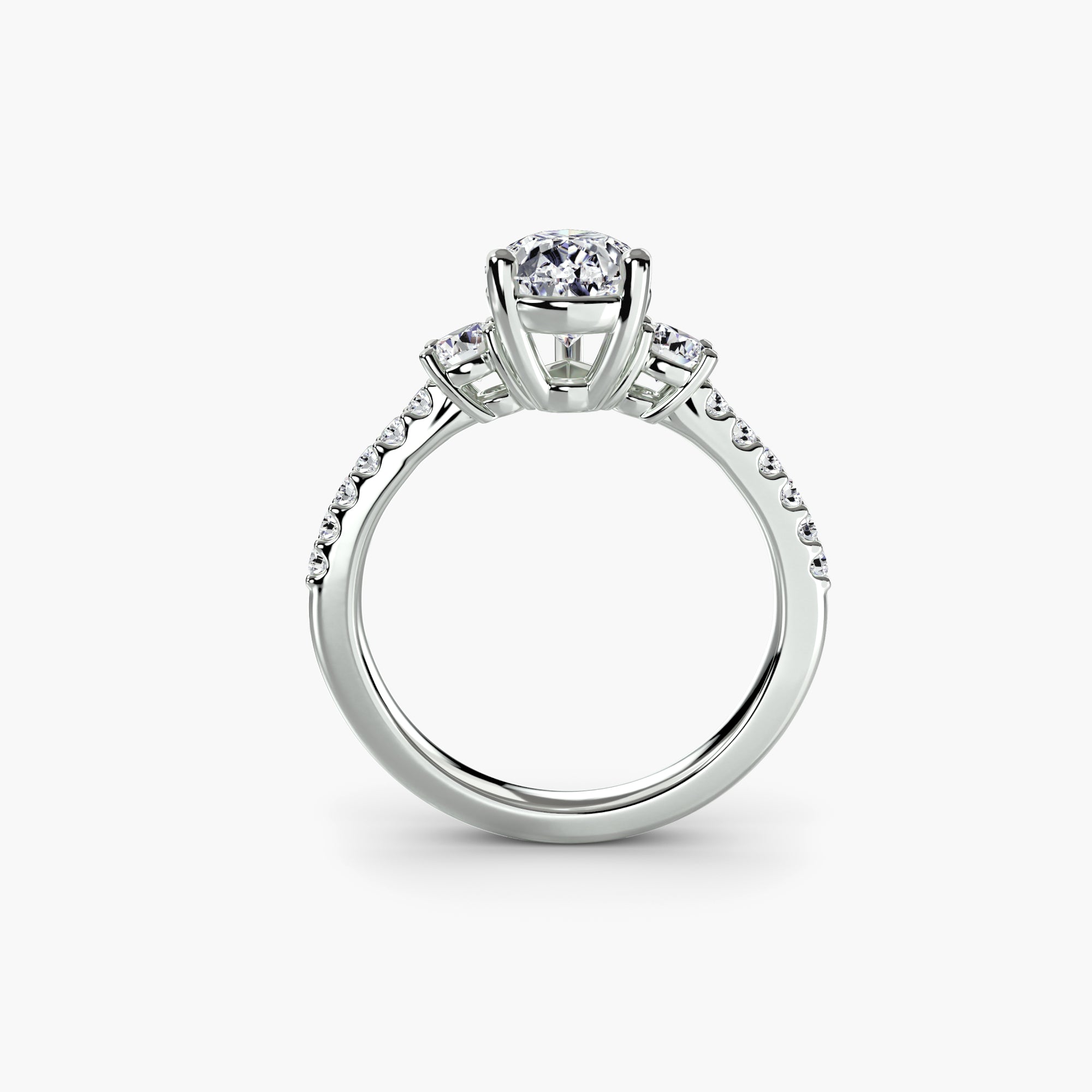 The "Victoria" Three-Stone Ring with Pavé Band