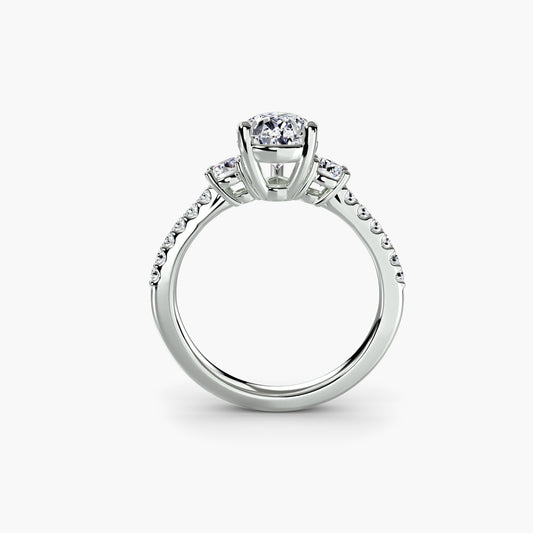 The "Victoria" Three-Stone Ring with Pavé Band
