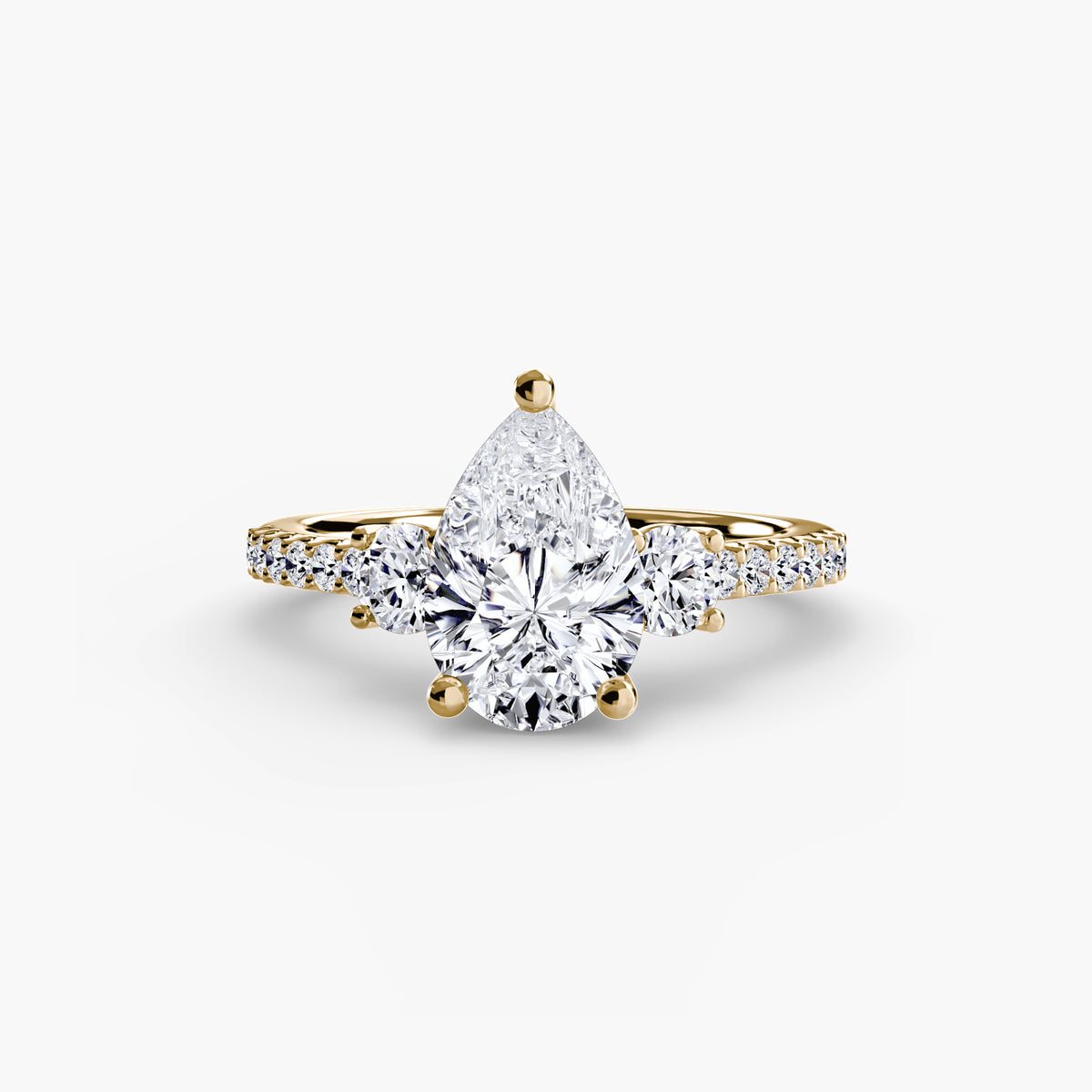 The "Victoria" Three-Stone Ring with Pavé Band